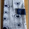 Protège chéquier blanc à coeurs bleus