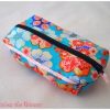 Trousse à tout carrée bleue à fleurs